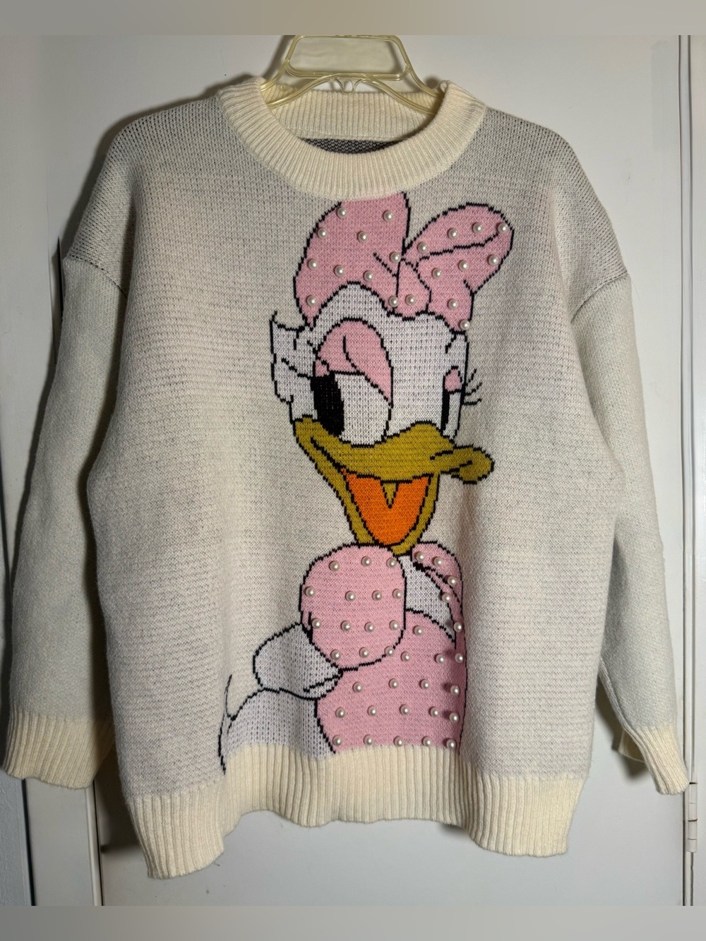 Pearl embellished Daisy Duck sweater. Images on the front and back. 22.5” P2P